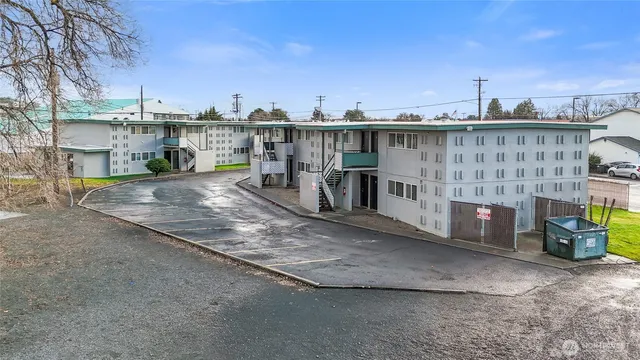 an aerial view of a house with a ocean view