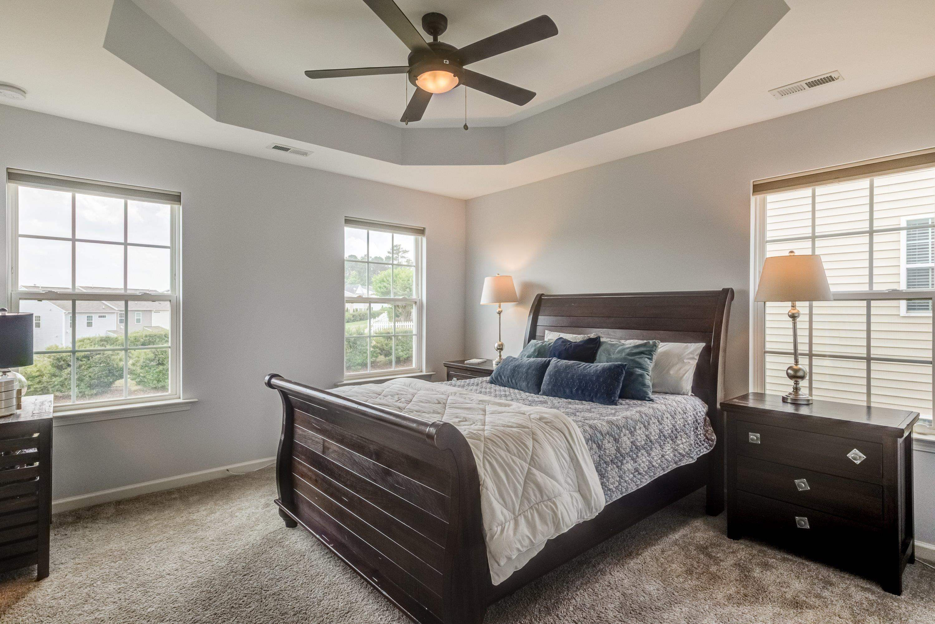 411 Provincial Street Raleigh, NC 27603 - Photo 19 of 41 a bedroom with a bed and a window