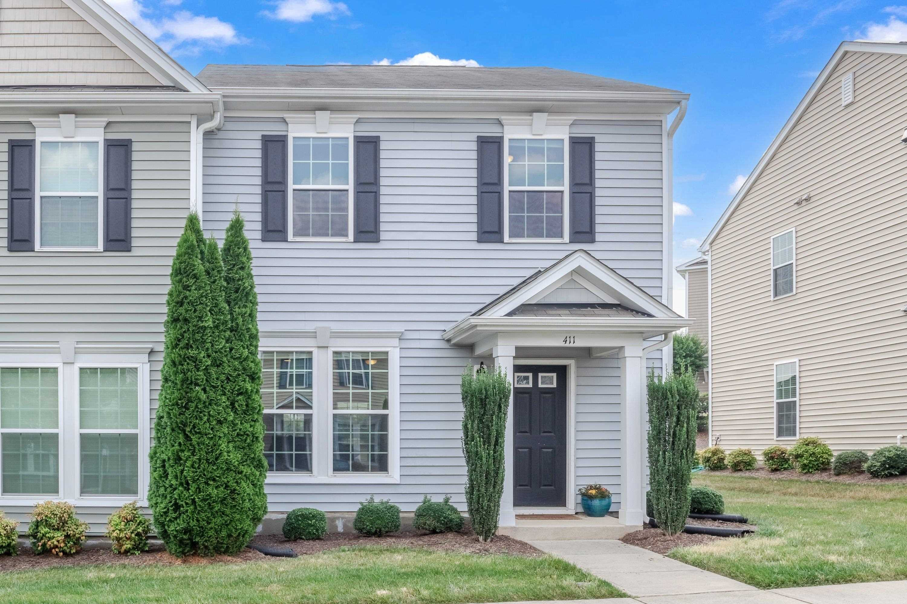 411 Provincial Street Raleigh, NC 27603 - Photo 2 of 41 a front view of a house with a yard