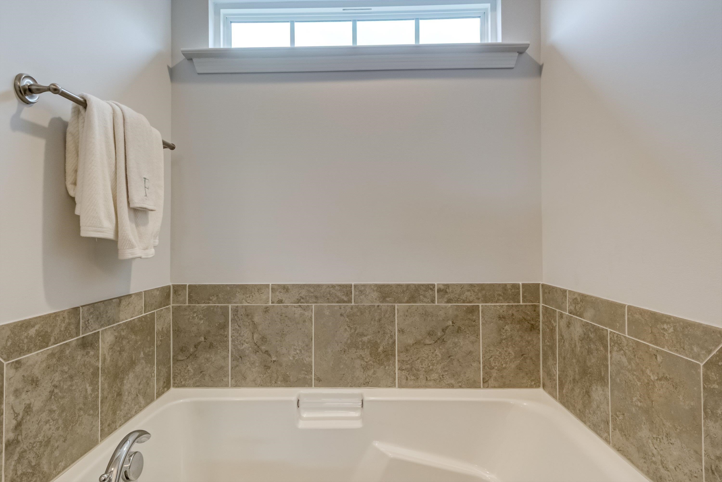 411 Provincial Street Raleigh, NC 27603 - Photo 22 of 41 a bathroom with a bathtub