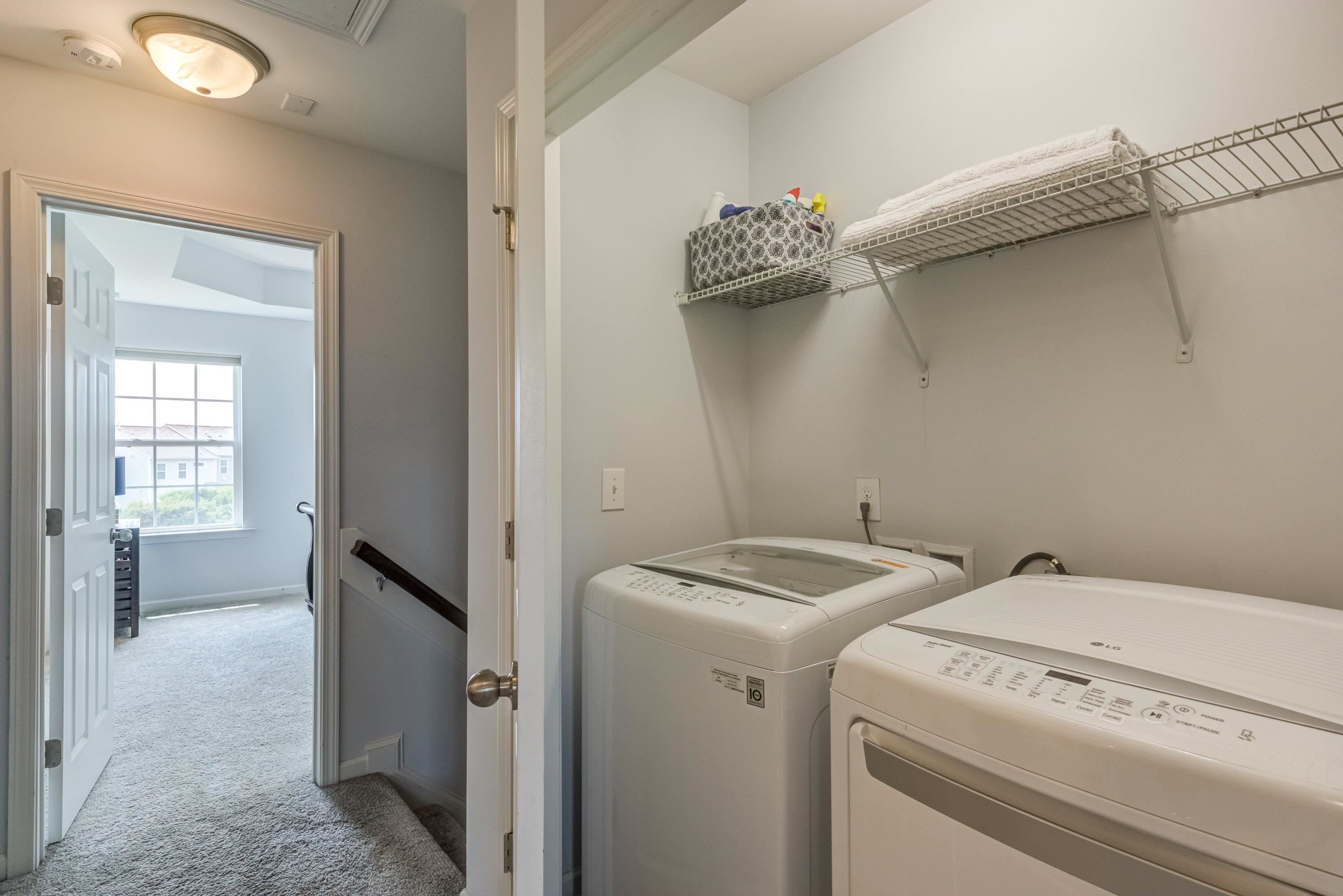 411 Provincial Street Raleigh, NC 27603 - Photo 28 of 41 a utility room with dryer and washer
