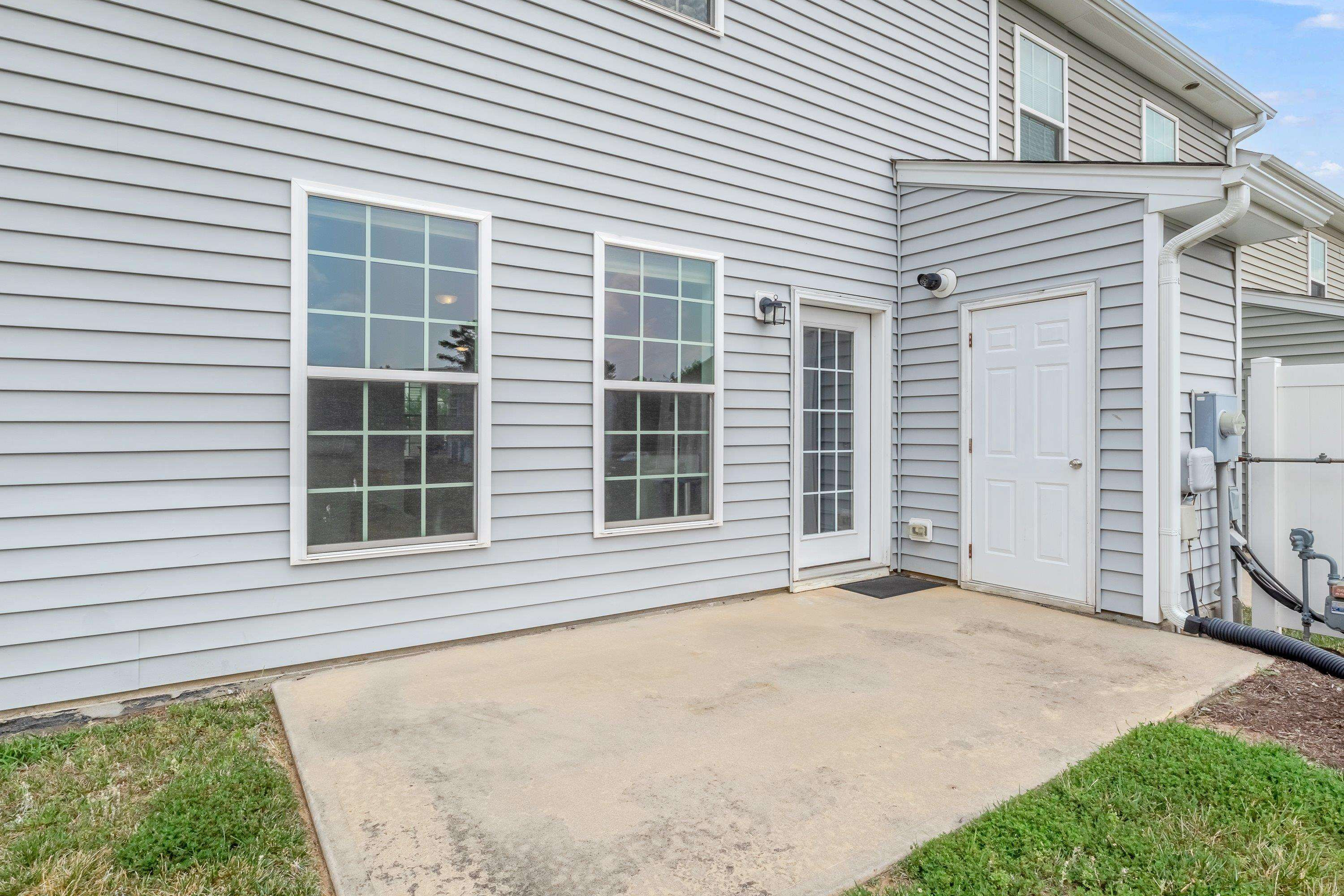 411 Provincial Street Raleigh, NC 27603 - Photo 29 of 41 a front view of a house with a yard and garage