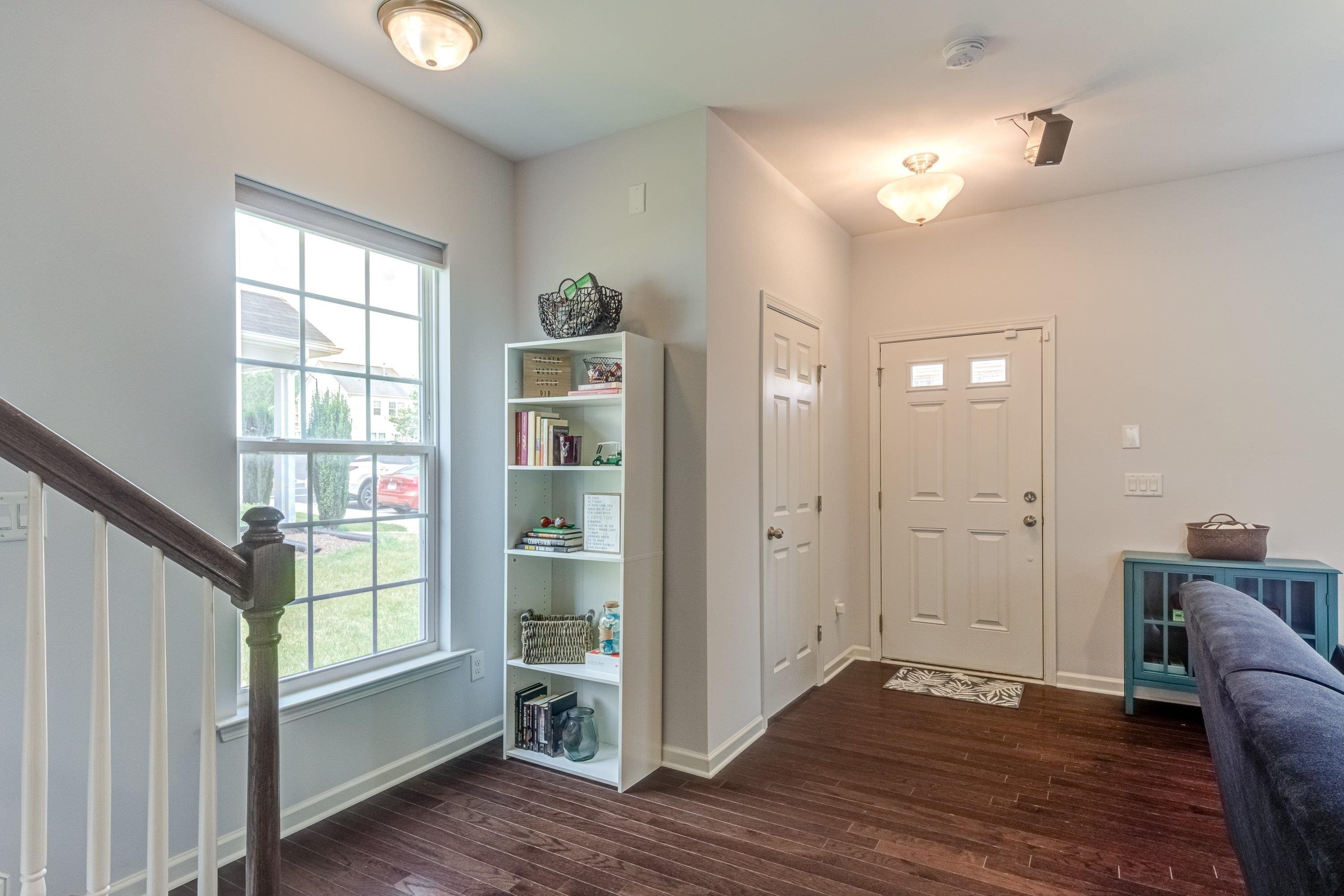 411 Provincial Street Raleigh, NC 27603 - Photo 3 of 41 a view of empty room with wooden floor and fan
