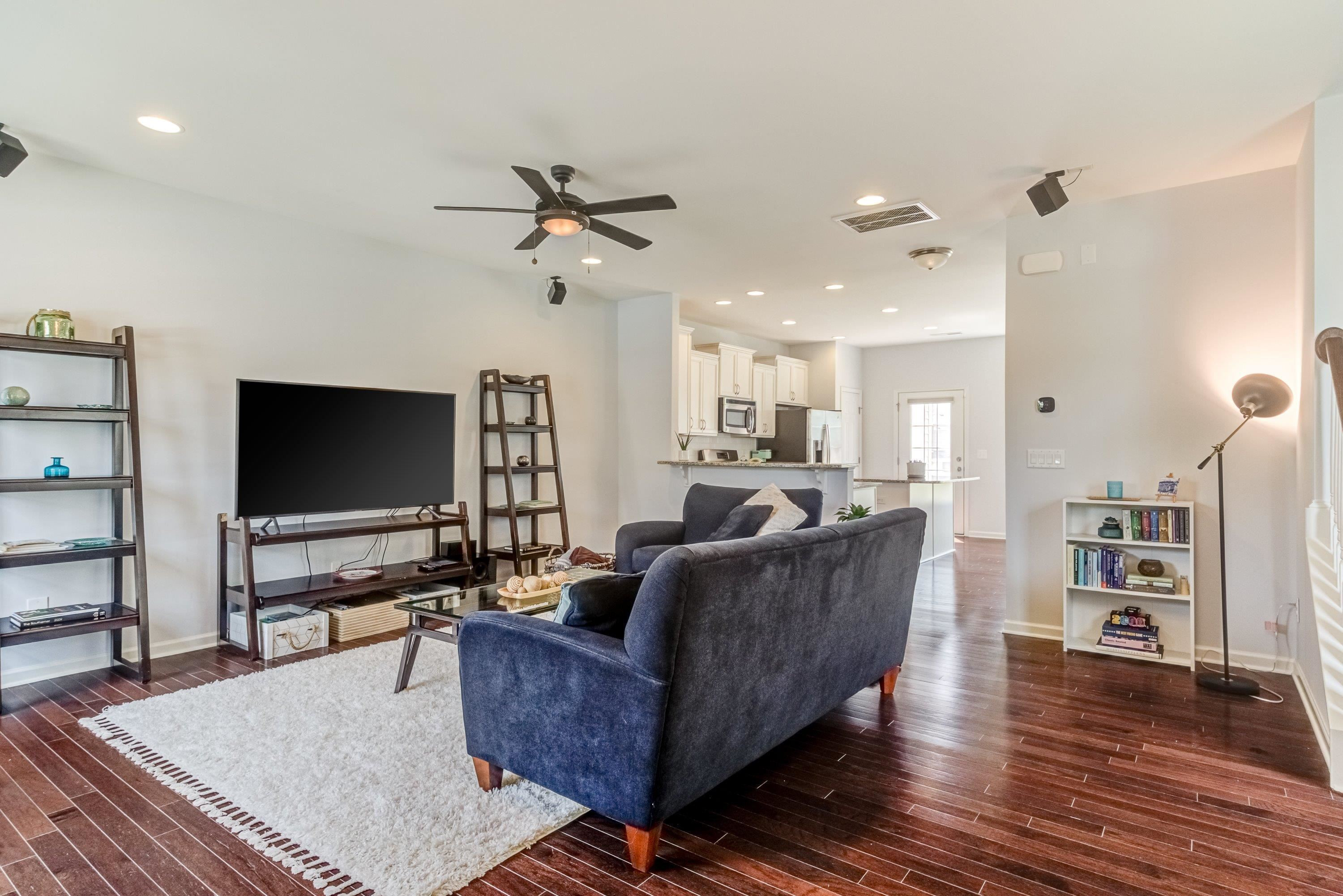 411 Provincial Street Raleigh, NC 27603 - Photo 6 of 41 a living room with furniture and a flat screen tv