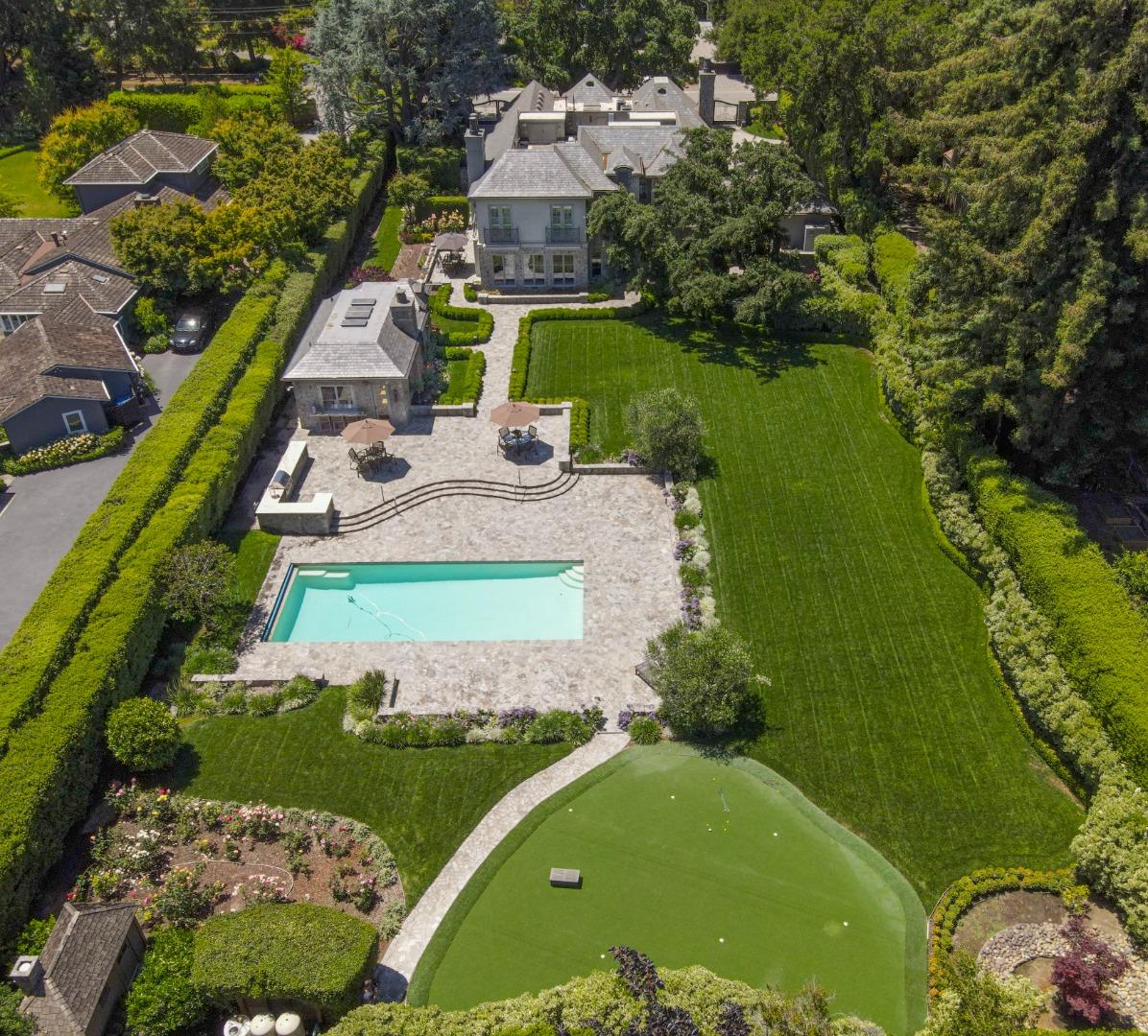 35 Ralston Road Atherton, CA 94027 - Photo 2 of 34 an aerial view of a house with a garden and lake view