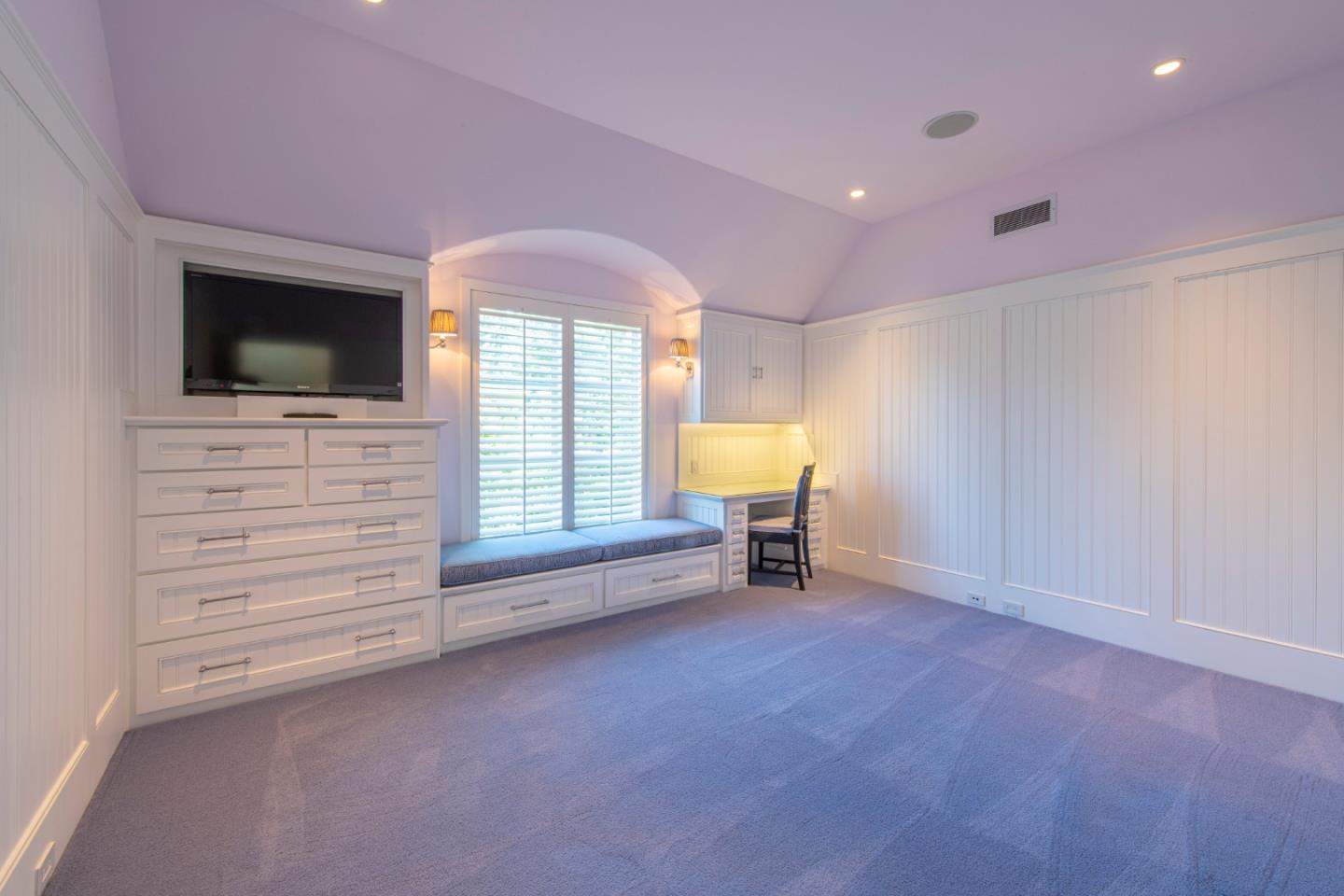 35 Ralston Road Atherton, CA 94027 - Photo 22 of 34 a view of an empty room with a window and fire place