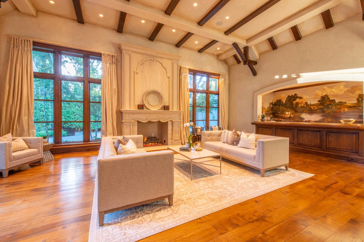 35 Ralston Road Atherton, CA 94027 - Photo 5 of 34 a living room with fireplace furniture and a large window