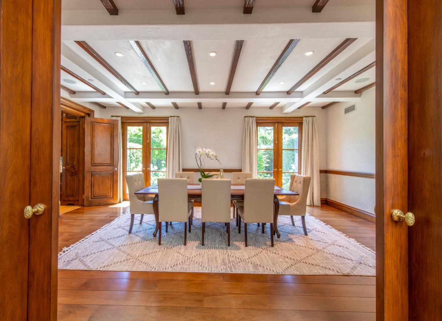 35 Ralston Road Atherton, CA 94027 - Photo 7 of 34 a view of a dining room with furniture window and wooden floor