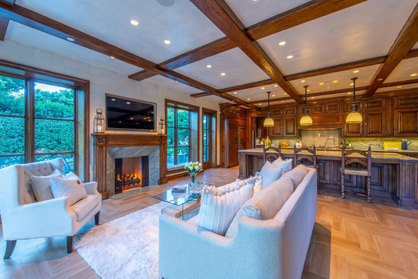 35 Ralston Road Atherton, CA 94027 - Photo 9 of 34 a living room with furniture a fireplace and a flat screen tv