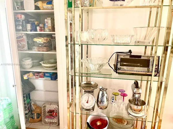 a view of a bathroom with a sink and a window