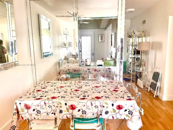 a room with a bed and a chandelier