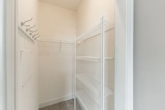 a view of an empty walk in closet