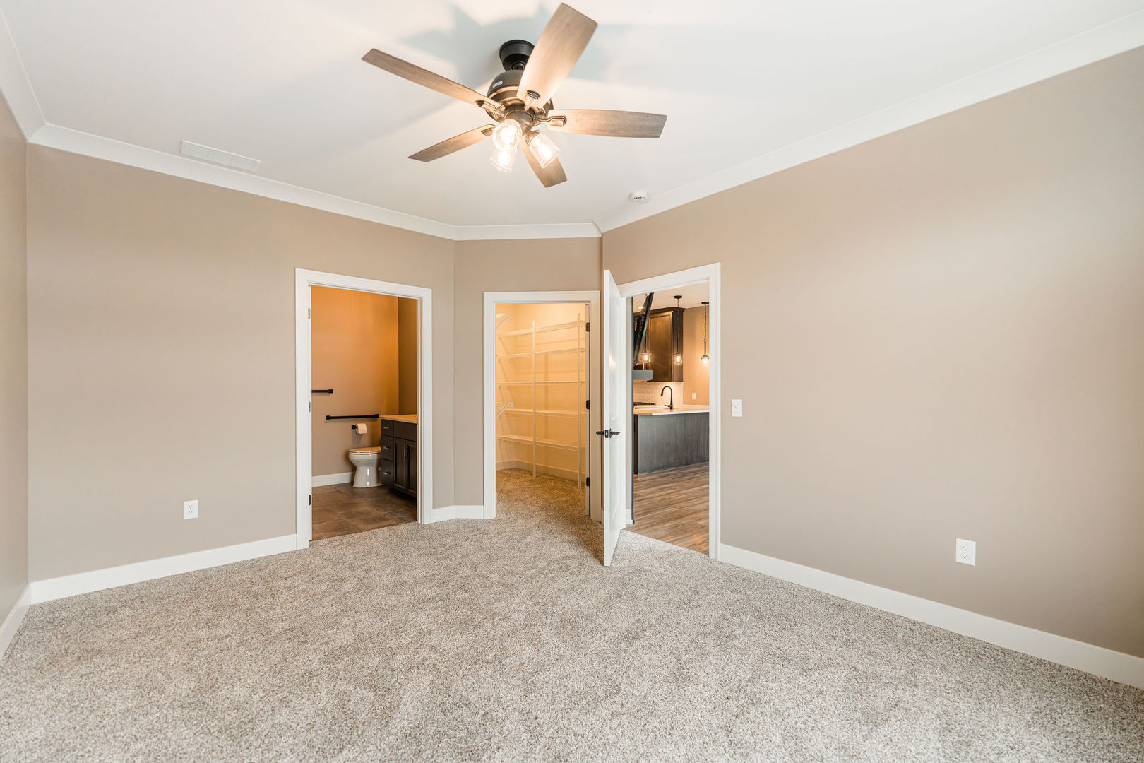 563 Stearn Drive, Unit 563 Genoa, IL 60135 - Photo 15 of 50 a view of a big room with closet and a ceiling fan