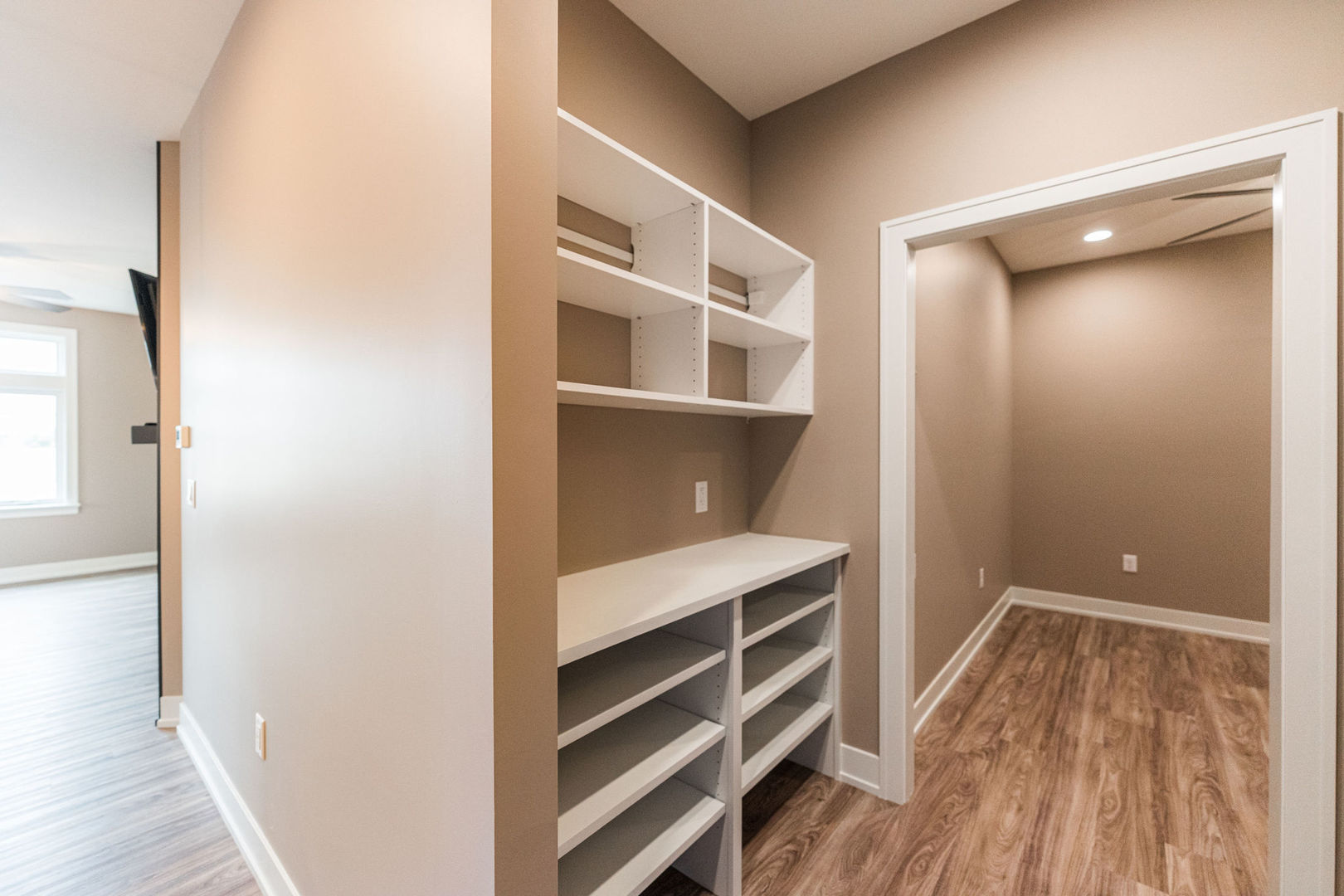 563 Stearn Drive, Unit 563 Genoa, IL 60135 - Photo 19 of 50 a view of walk in closet with empty racks