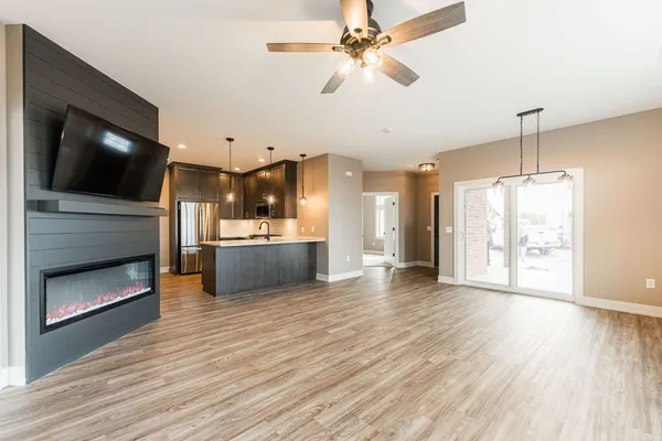 a view of a kitchen with a dishwasher cabinets and a kitchen floor