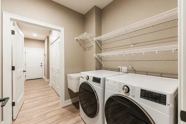 a utility room with dryer and washer