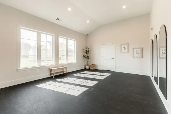 an empty room with windows