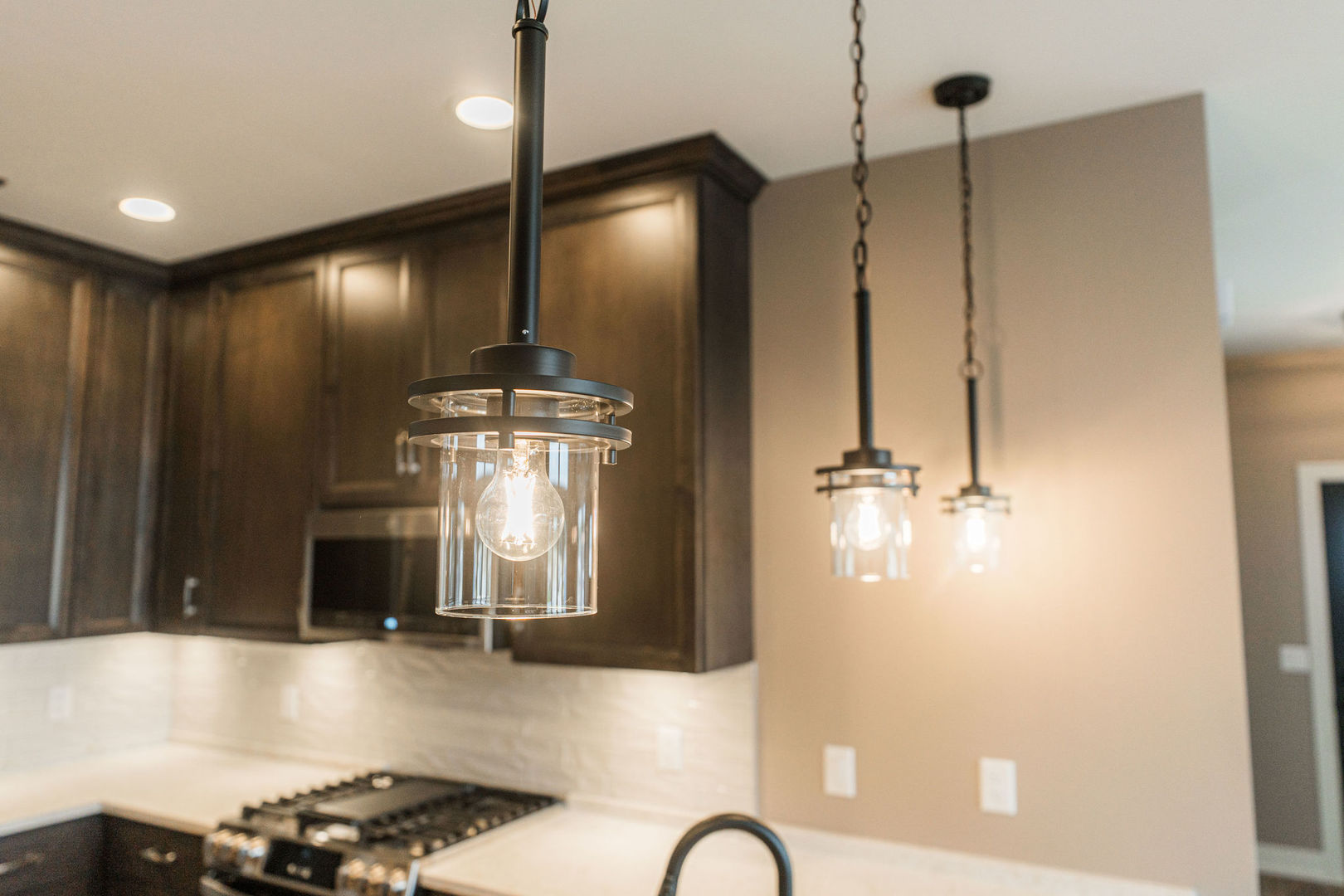 563 Stearn Drive, Unit 563 Genoa, IL 60135 - Photo 6 of 50 a bathroom with a mirror a sink and glass door