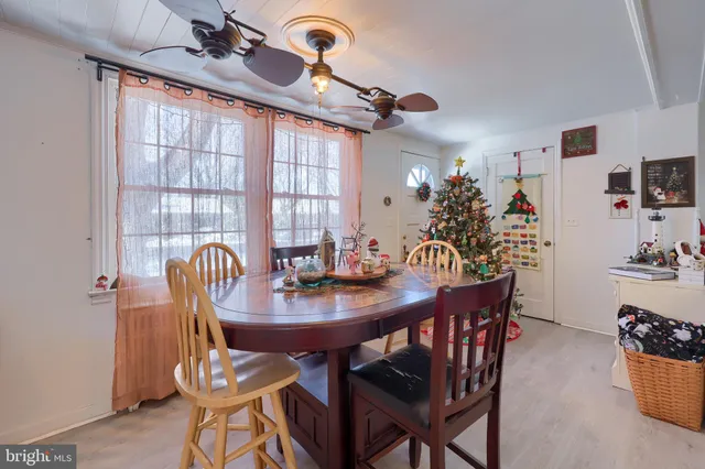 a view of a dining room with furniture