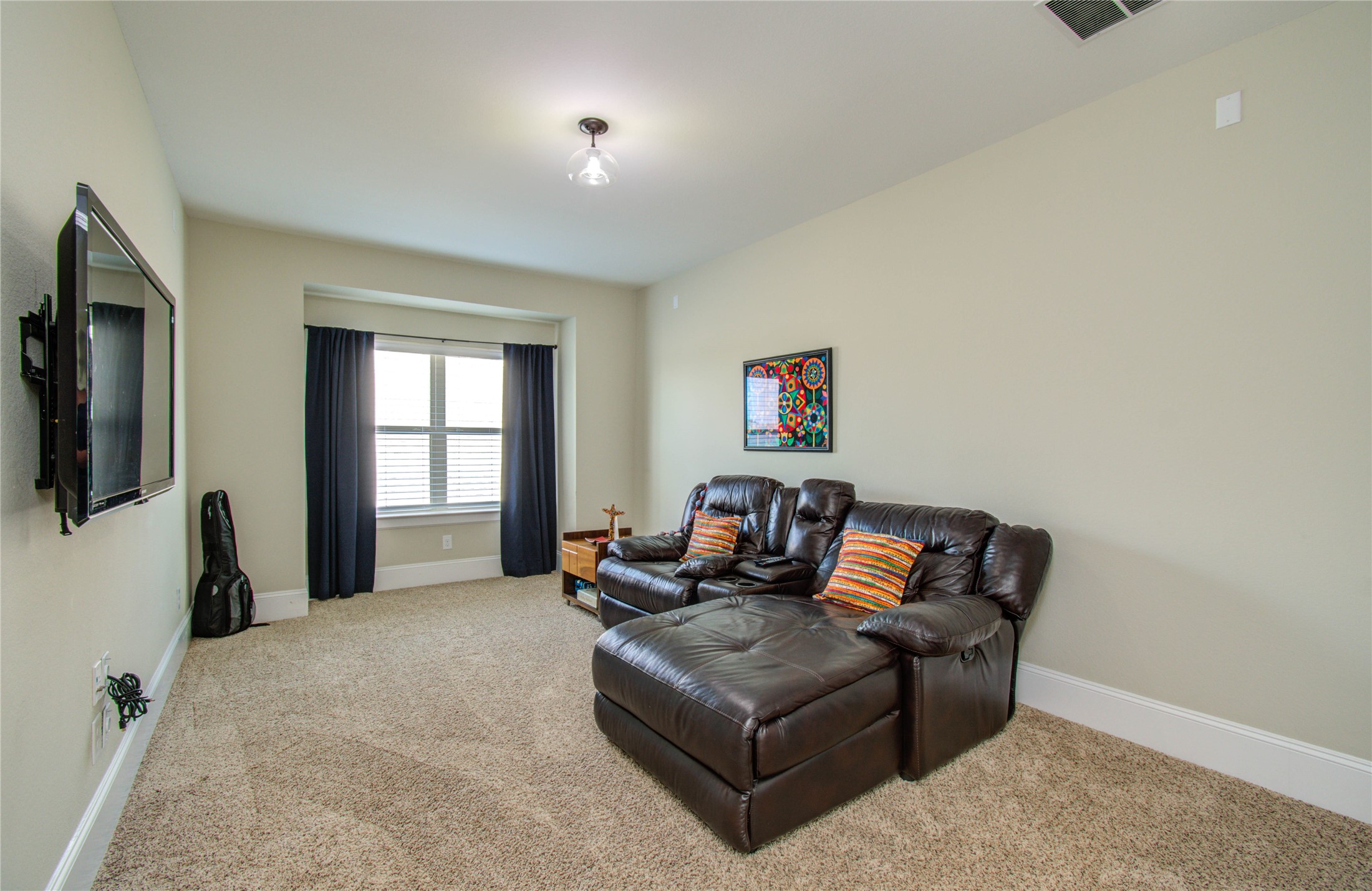 28627 Rolling Ridge Drive Katy, TX 77494 - Photo 37 of 44 a living room with furniture and a flat screen tv