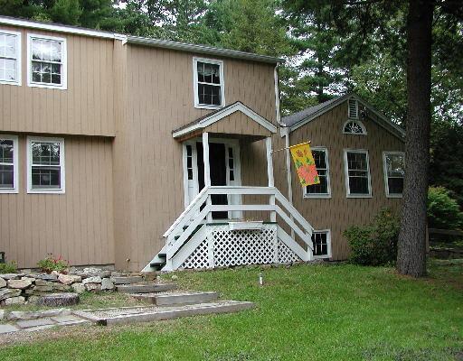 566 Redding Road Redding, CT 06896 - Photo 1 of 1 a view of a house with a yard