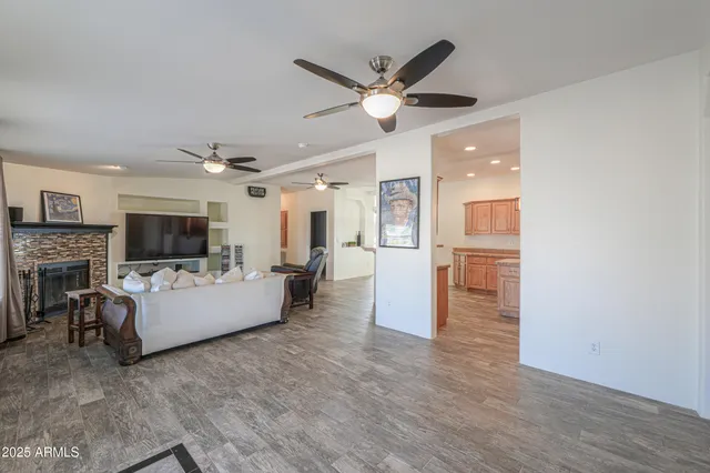 a view of a dining room with furniture and a potted plant
