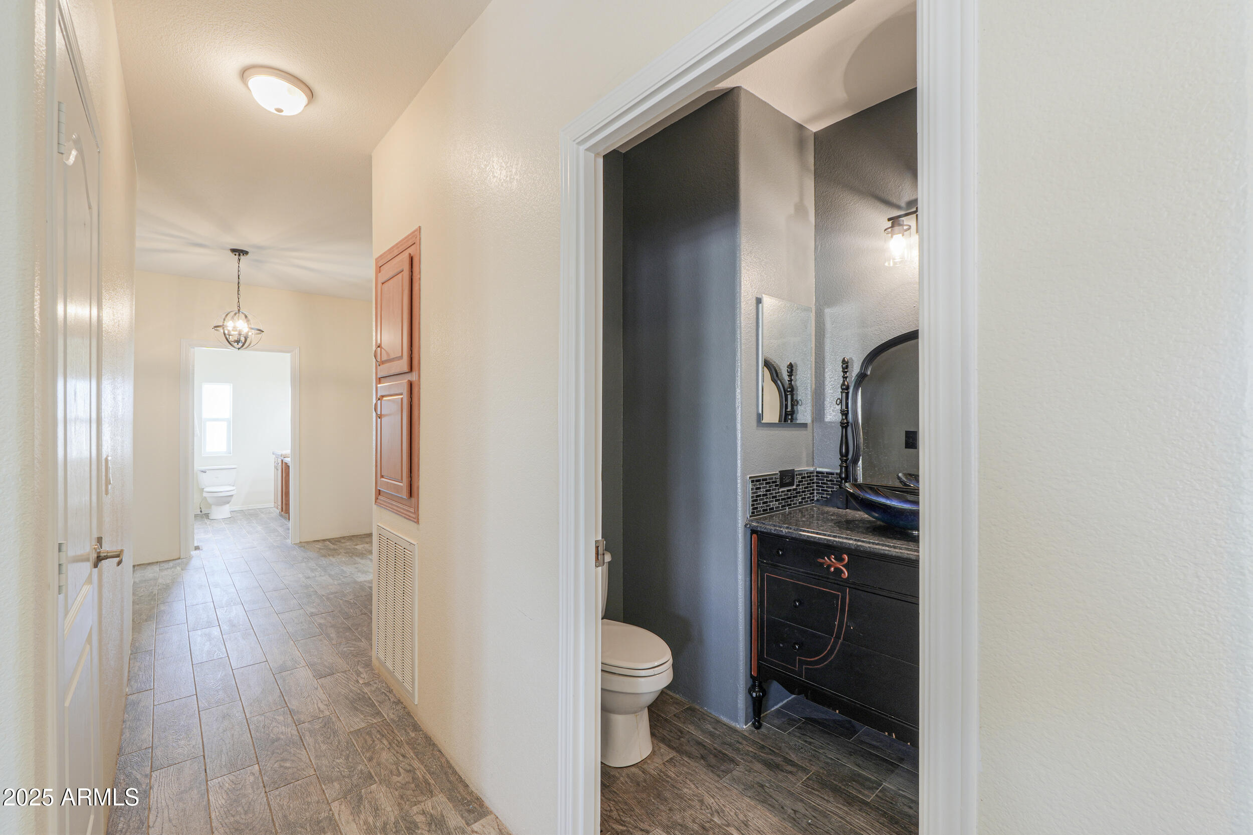 176 North Acacia Road Apache Junction, AZ 85119 - Photo 47 of 65 a bathroom with a sink a toilet and shower