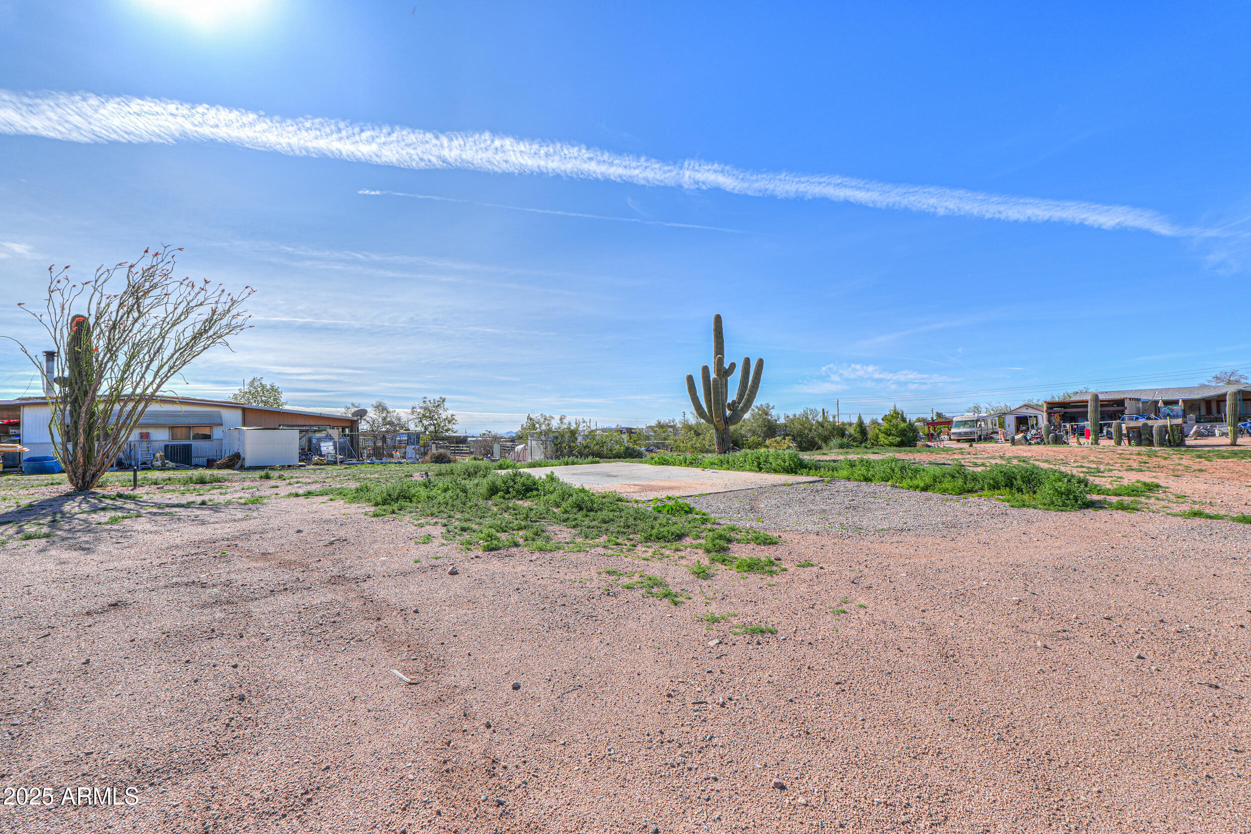 176 North Acacia Road Apache Junction, AZ 85119 - Photo 60 of 65 a view of a dirt road and a building