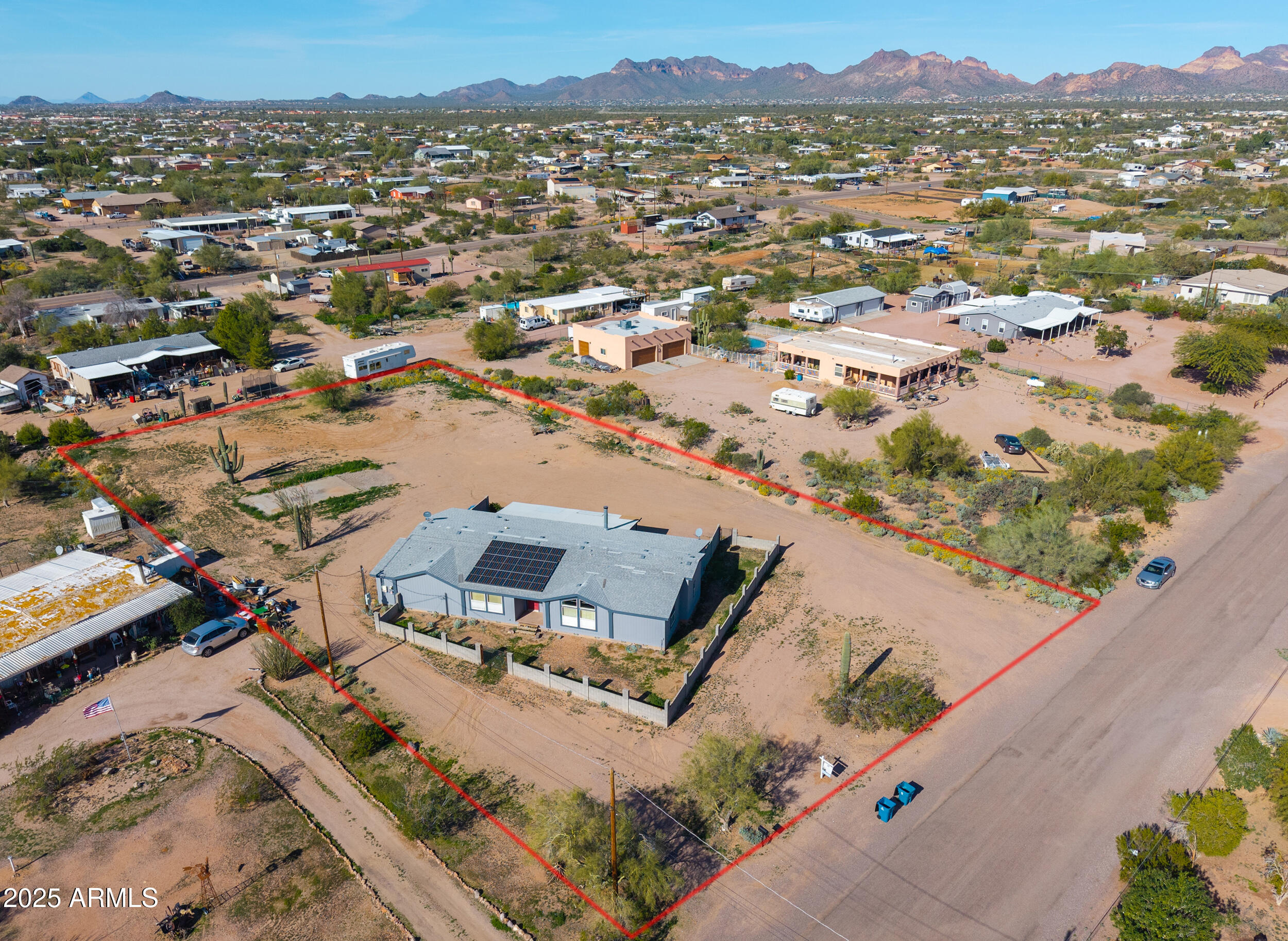 176 North Acacia Road Apache Junction, AZ 85119 - Photo 62 of 65 an aerial view of a city with lots of residential buildings