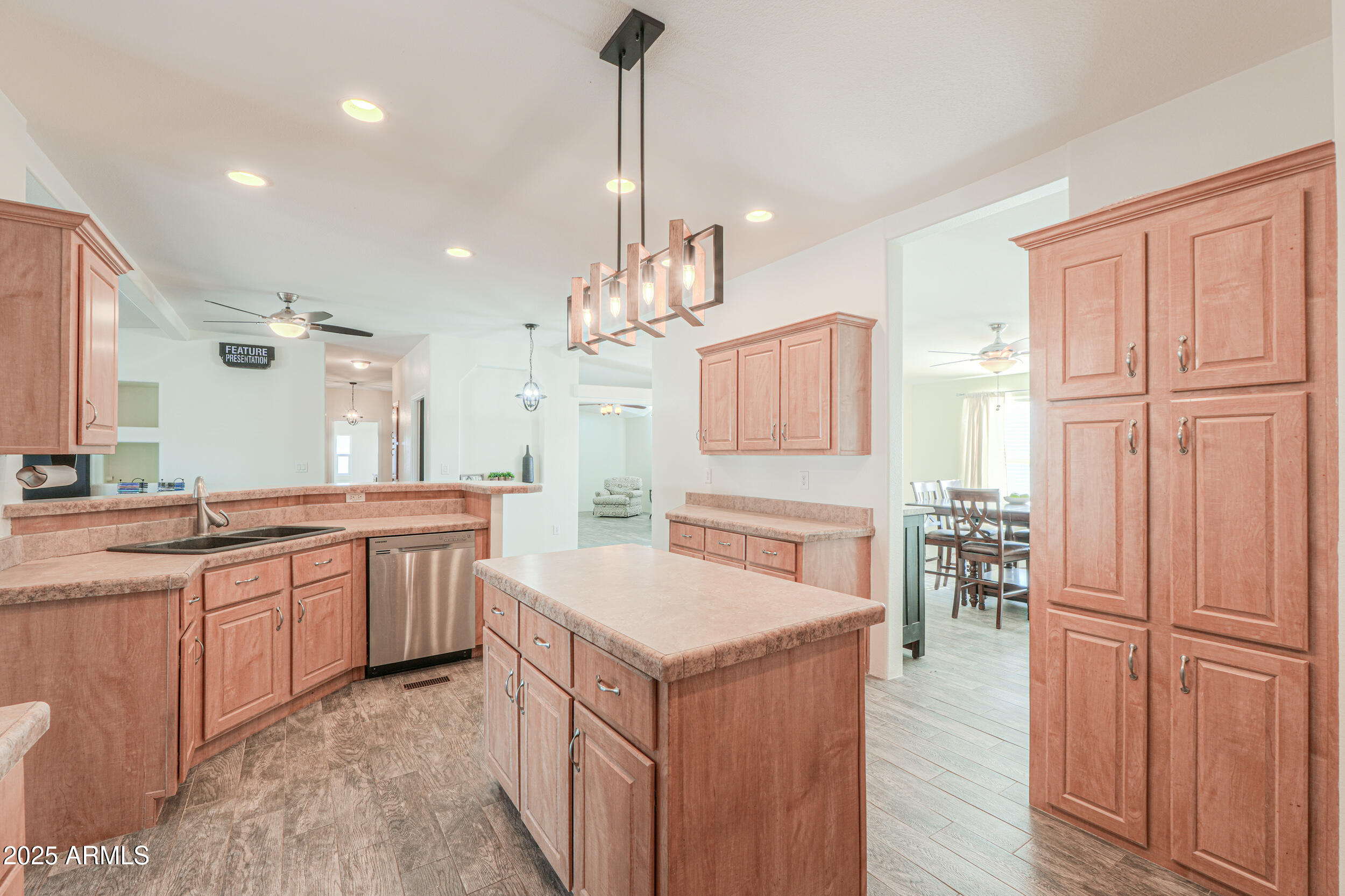 176 North Acacia Road Apache Junction, AZ 85119 - Photo 9 of 65 a kitchen with granite countertop a sink stove and refrigerator