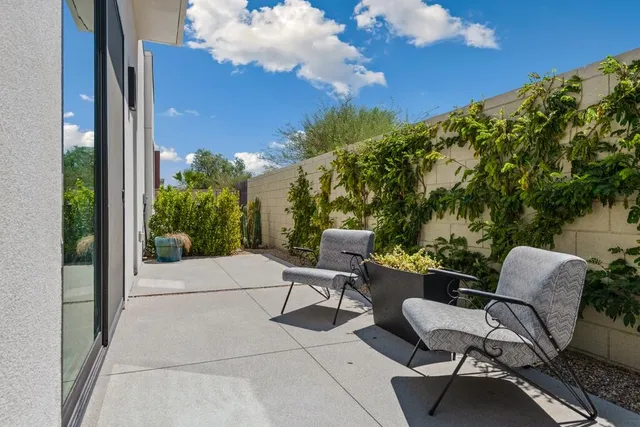 a bathroom with a shower sink vanity and mirror