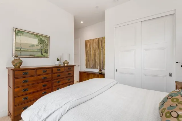 a room with a chair and a window