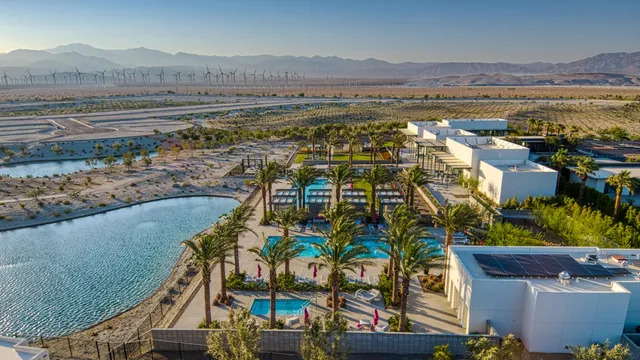 a view of a chairs and table in patio