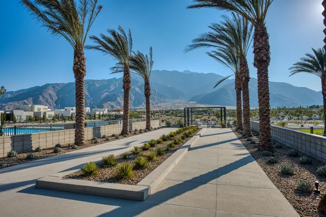 a room with gym equipment and large window