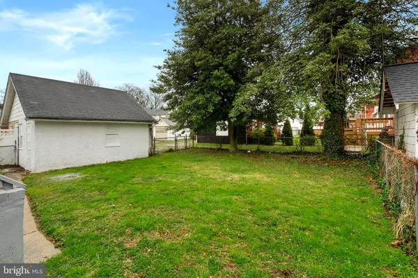 a view of a backyard with a garden