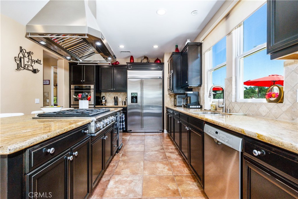 2191 Lake Ysabel Road Templeton, CA 93465 - Photo 22 of 73 a kitchen with stainless steel appliances granite countertop a sink and a refrigerator