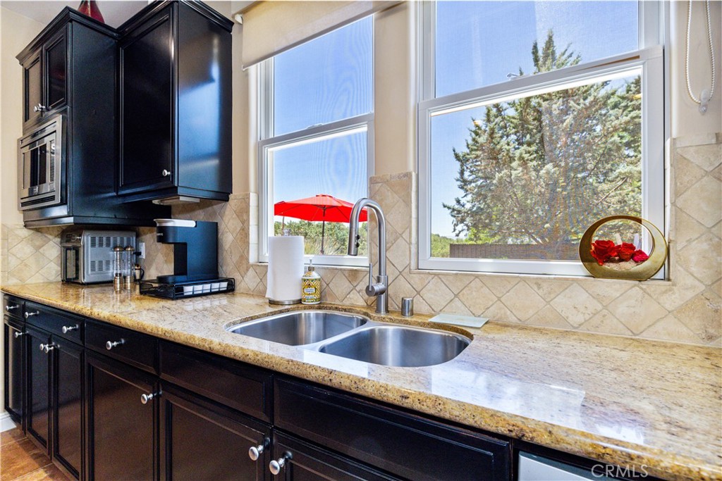 2191 Lake Ysabel Road Templeton, CA 93465 - Photo 23 of 73 a kitchen with granite countertop a sink and a window
