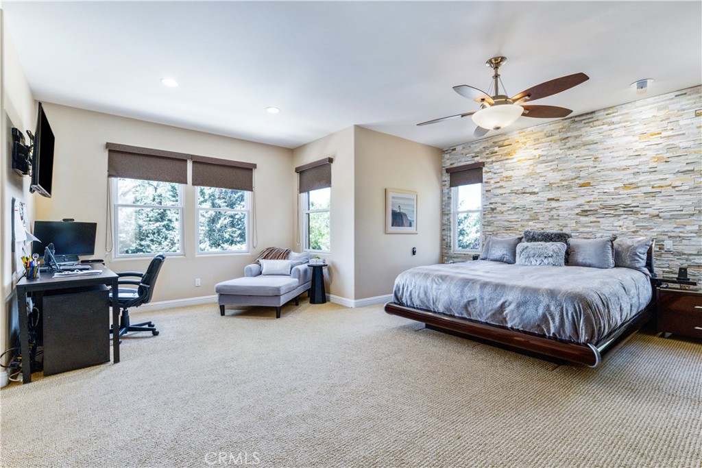 2191 Lake Ysabel Road Templeton, CA 93465 - Photo 44 of 73 a spacious bedroom with a bed and a large window