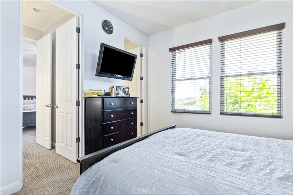 2191 Lake Ysabel Road Templeton, CA 93465 - Photo 61 of 73 a bedroom with a bed and a flat screen tv