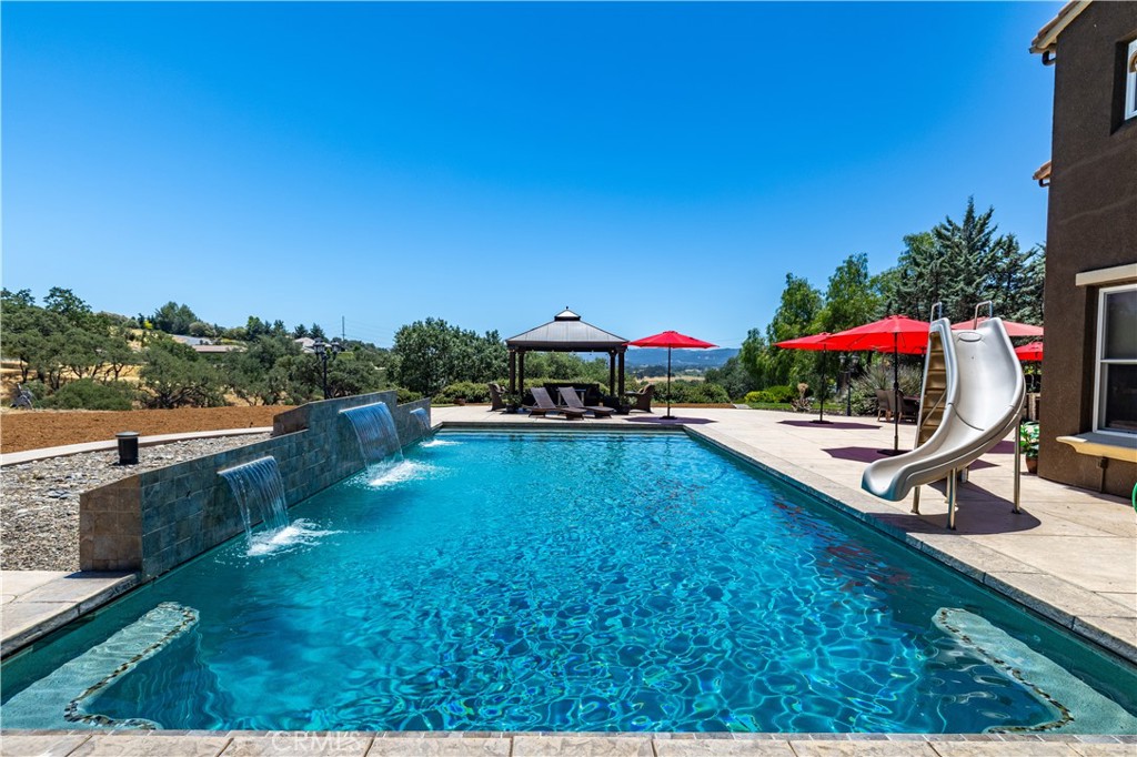 2191 Lake Ysabel Road Templeton, CA 93465 - Photo 66 of 73 a swimming pool with outdoor seating and yard