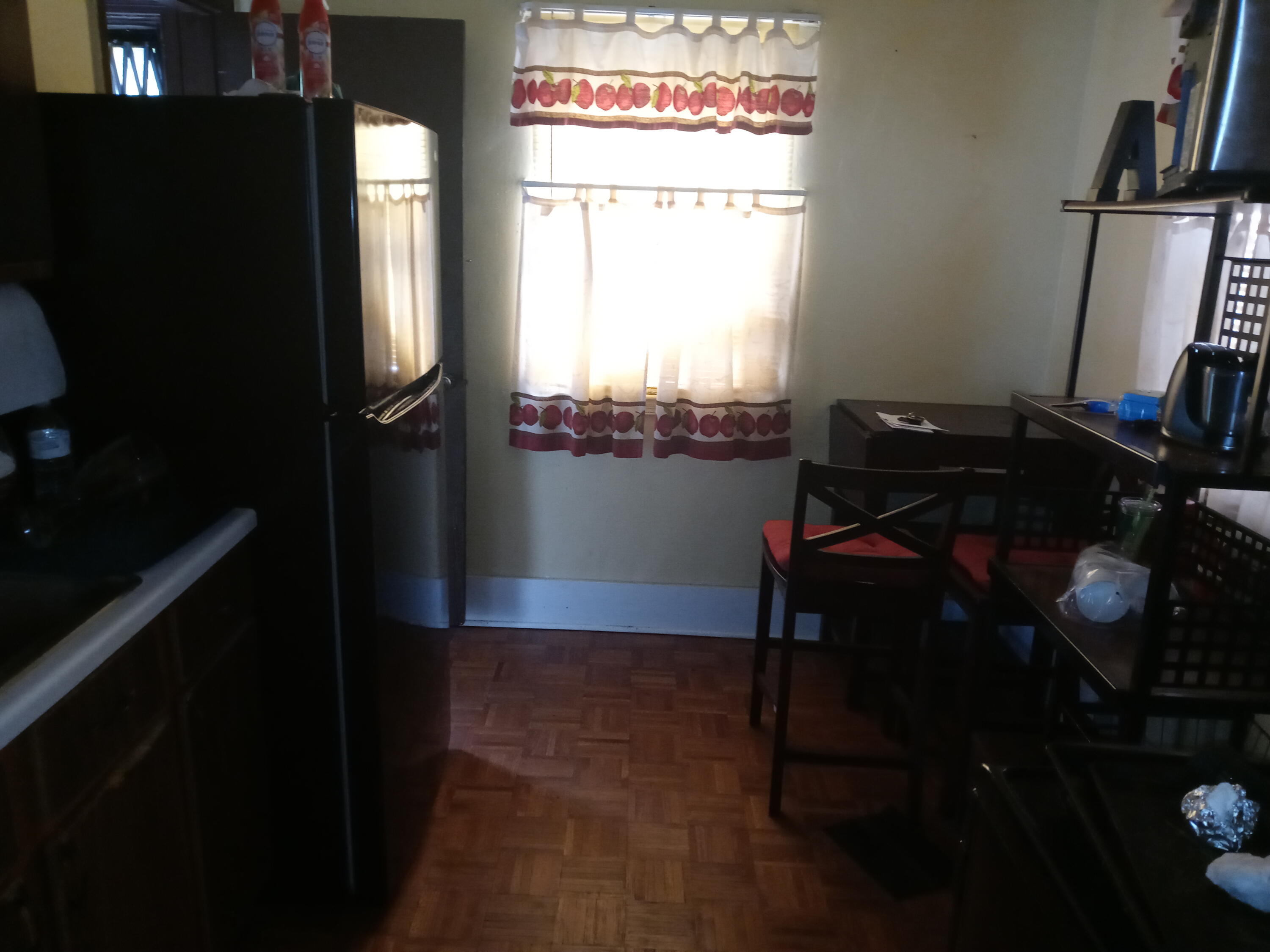3461 Johnson Street Gary, IN 46408 - Photo 2 of 6 a living room with furniture and a window