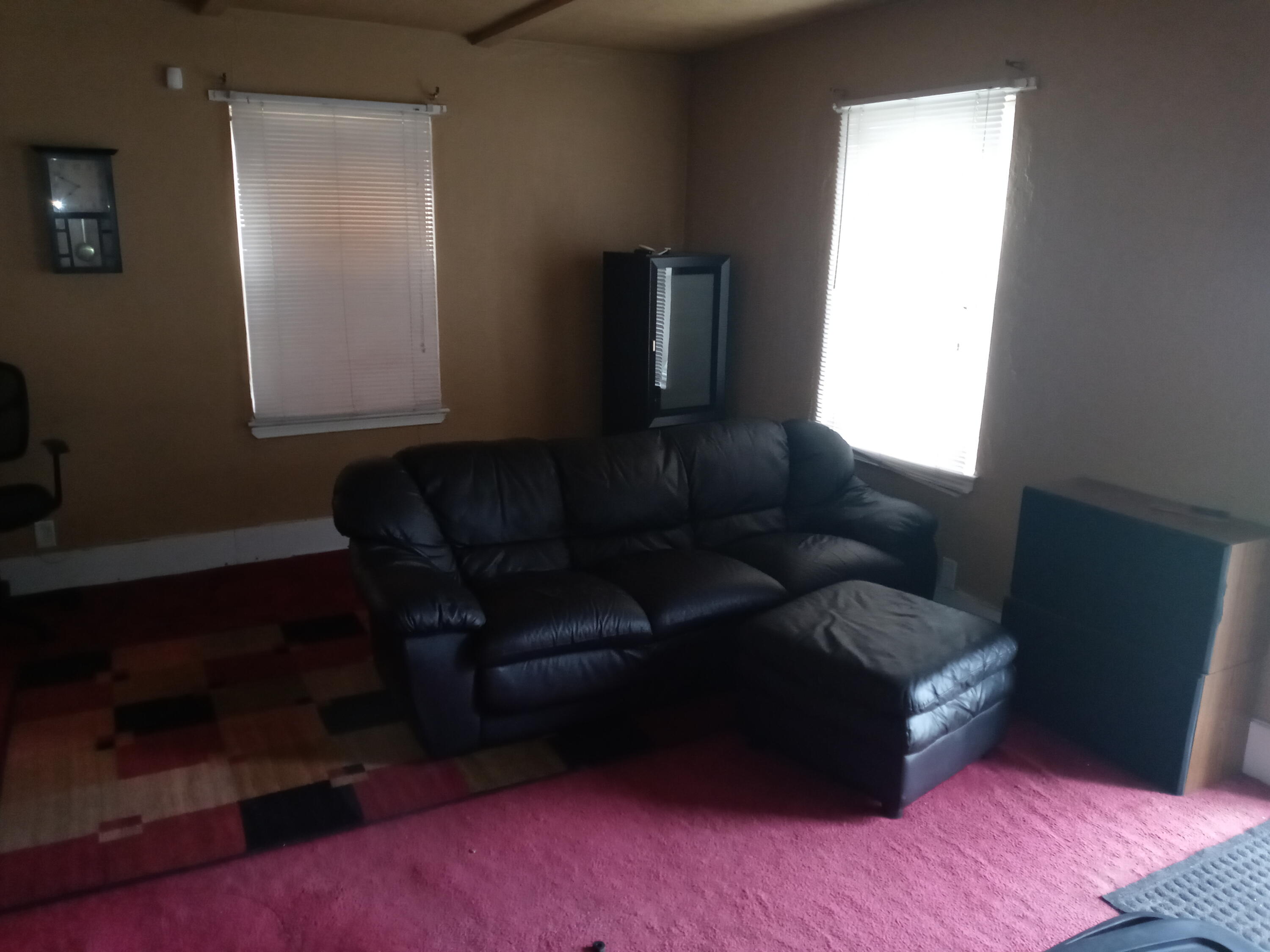 3461 Johnson Street Gary, IN 46408 - Photo 3 of 6 a living room with furniture and a window