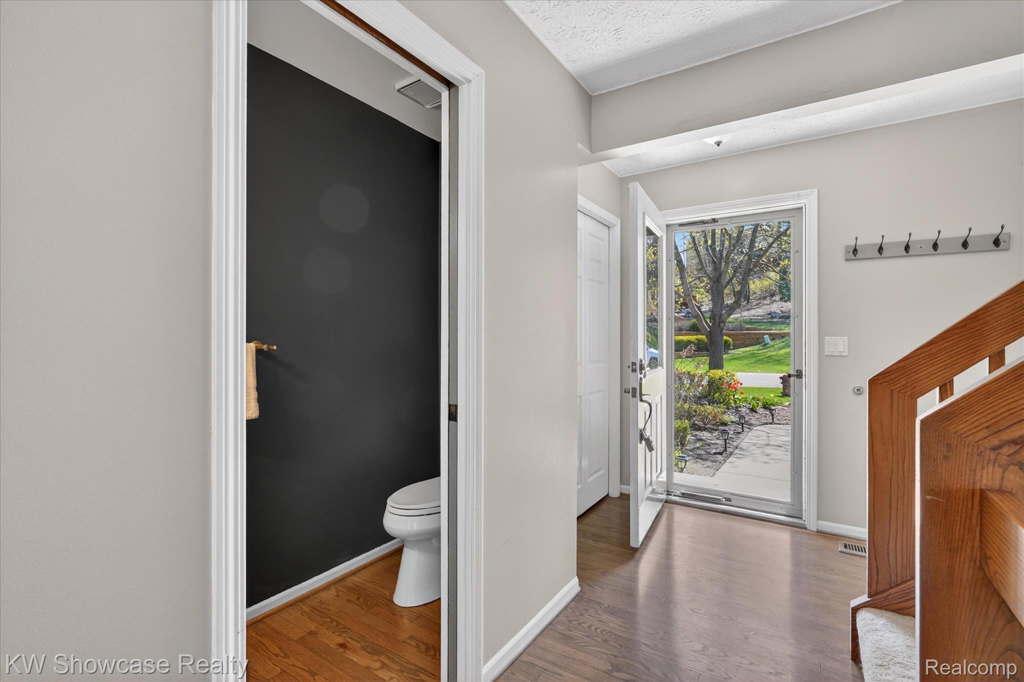 6626 Ridgeview Drive Clarkston, MI 48346 - Photo 6 of 35 Step inside the foyer. The half bath is pictured here too.