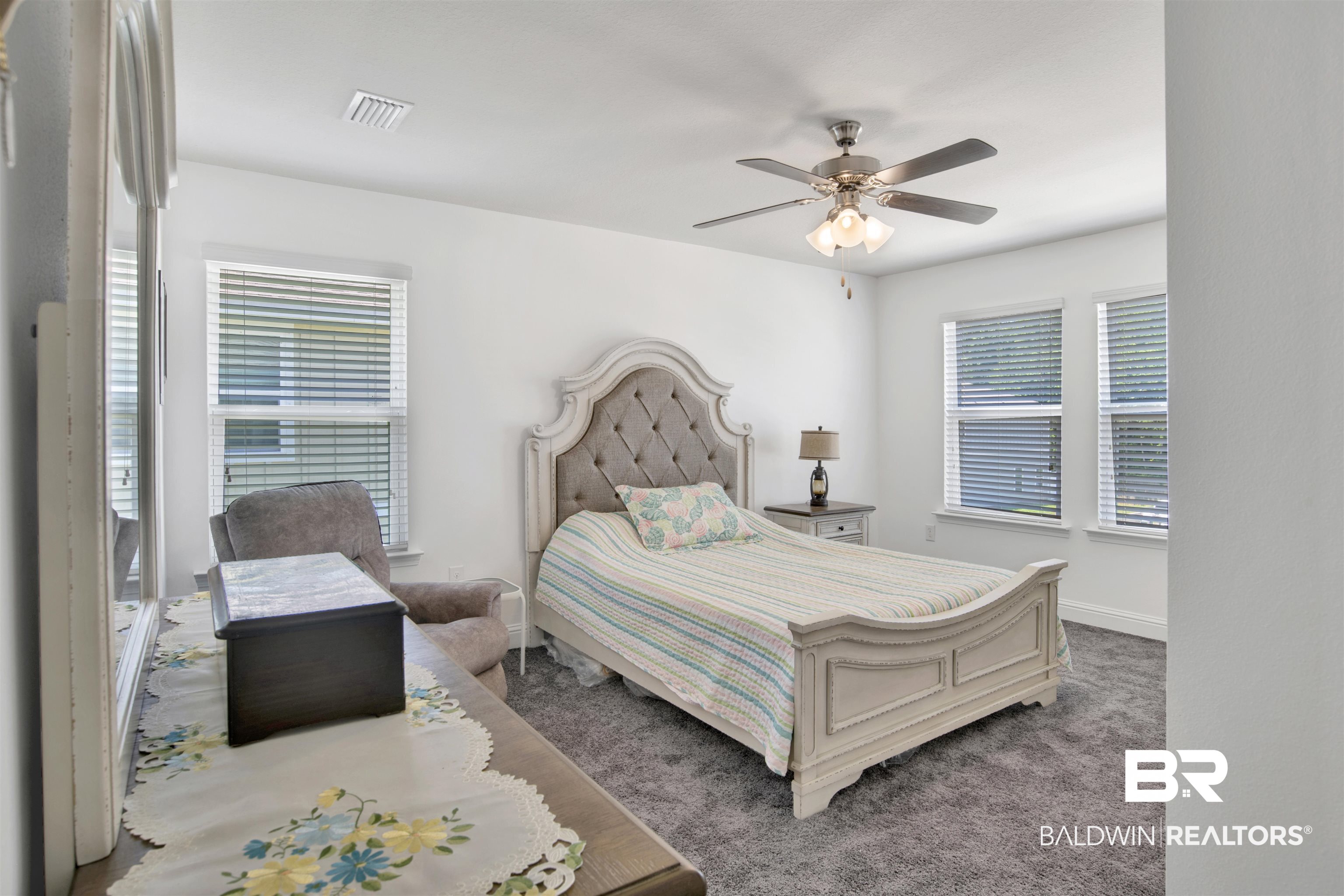 25806 Pollard Road, Unit 20 Daphne, AL 36526 - Photo 9 of 29 Carpeted bedroom featuring ceiling fan