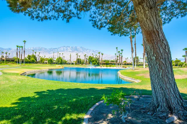 a view of a lake with a big yard