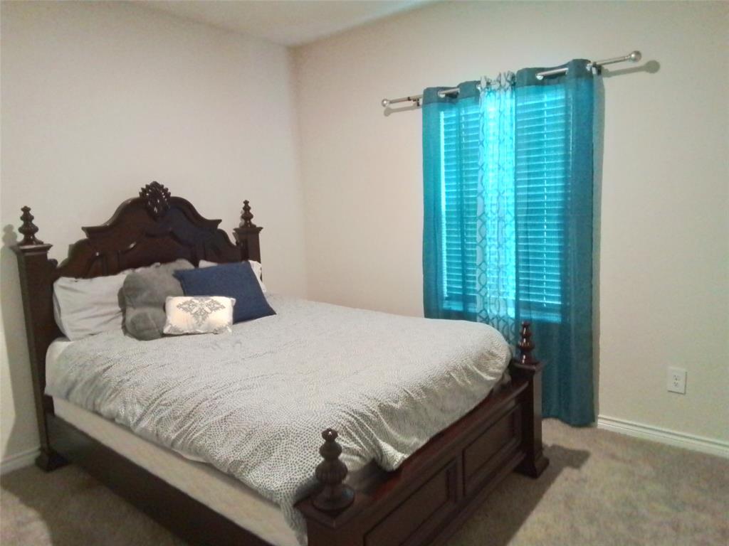 9712 Quail Pointe Road Aubrey, TX 76227 - Photo 15 of 22 2nd bedroom downstarirs