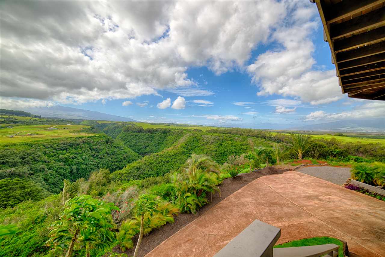 2311 Umi Place Haiku, HI 96708 - Photo 2 of 21 a view of a pathway both side of grassy field with shrub