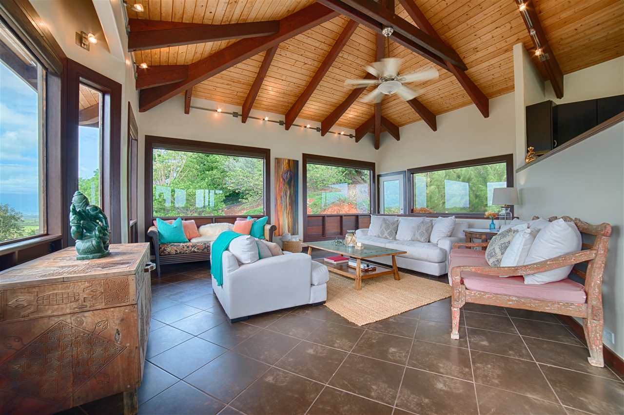 2311 Umi Place Haiku, HI 96708 - Photo 7 of 21 a living room with furniture and a large window