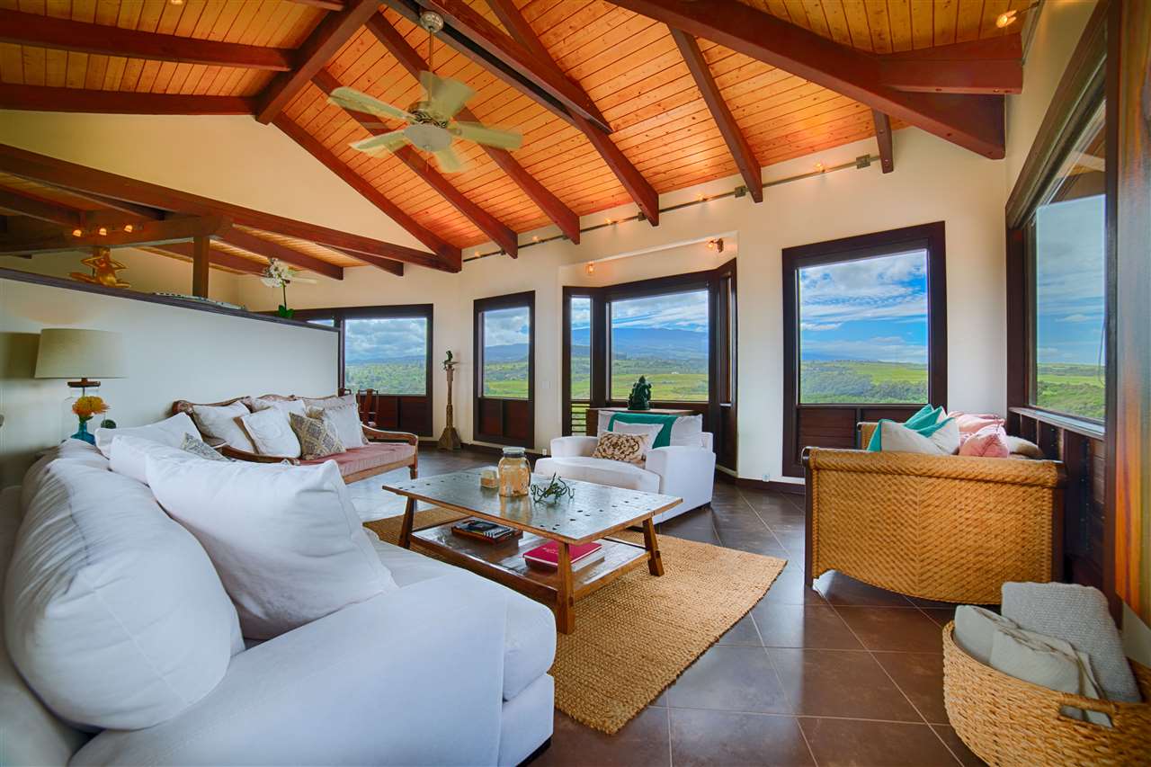 2311 Umi Place Haiku, HI 96708 - Photo 8 of 21 a living room with furniture and a large window