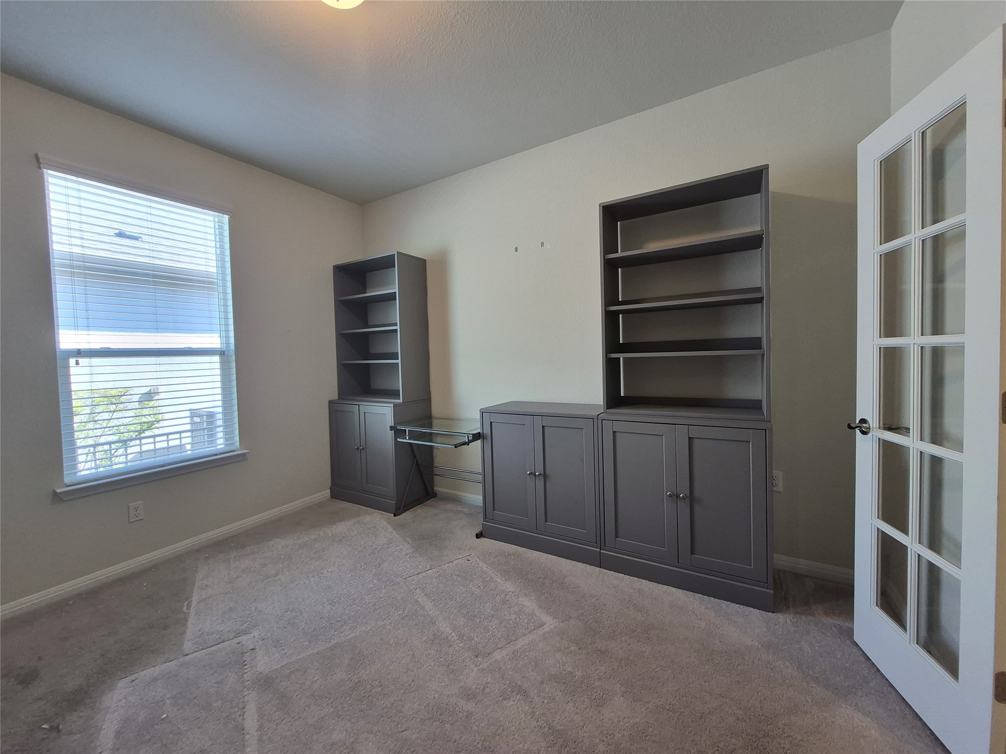 108 Calhoun Lane Georgetown, TX 78633 - Photo 11 of 27 Unfurnished office with baseboards and carpet